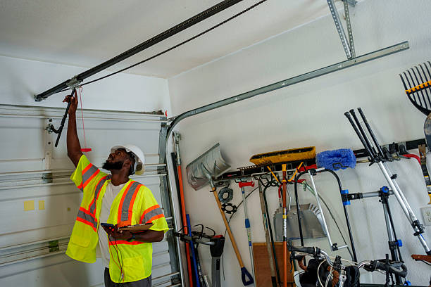 Professional Garage Door Installation technician working in Lenexa, KS